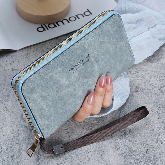 Damen halten eine lange Geldbörse 2025, neue koreanische Handtasche