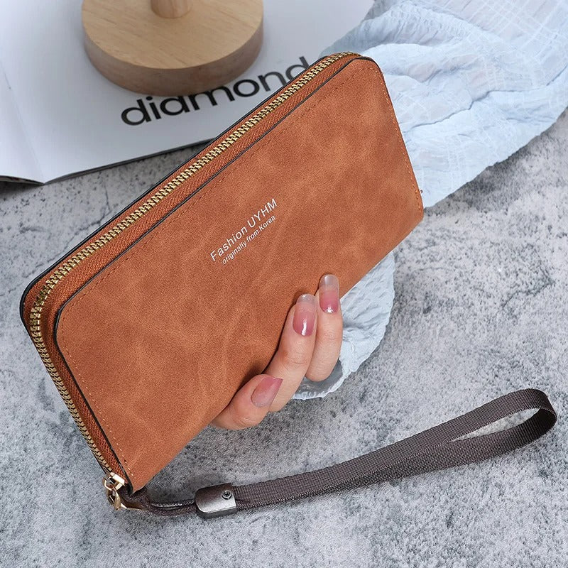 Damen halten eine lange Geldbörse 2025, neue koreanische Handtasche