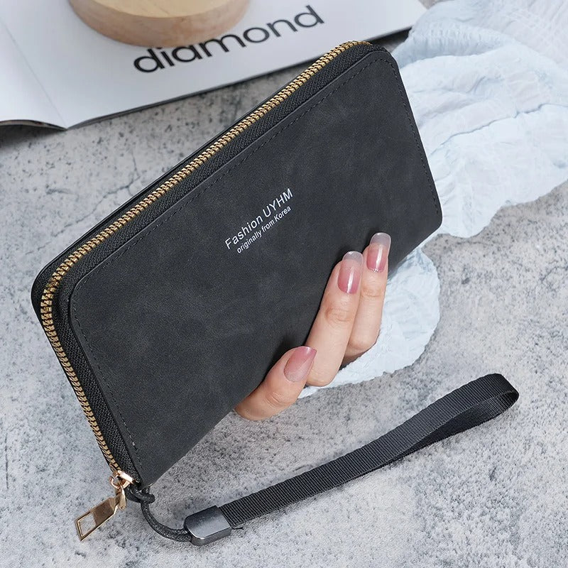Damen halten eine lange Geldbörse 2025, neue koreanische Handtasche